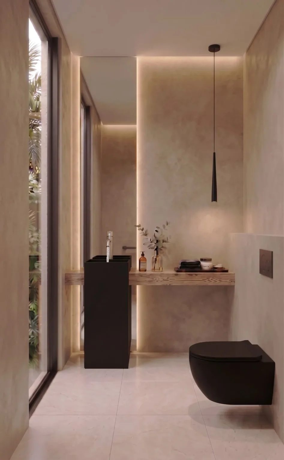 Aseo de cortesía con lavabo oscuro e iluminación indirecta